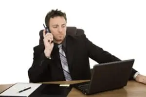 Photo of person speaking on the phone
